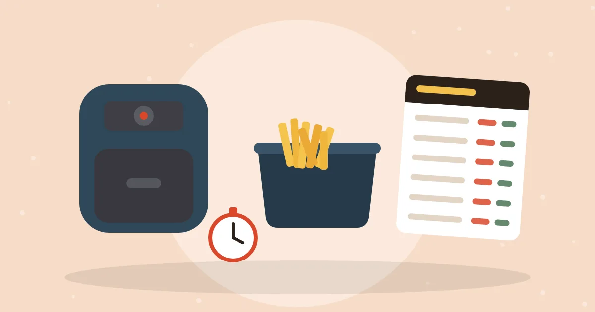 Air fryer with an open basket of golden fries beside a cooking times chart and a kitchen timer