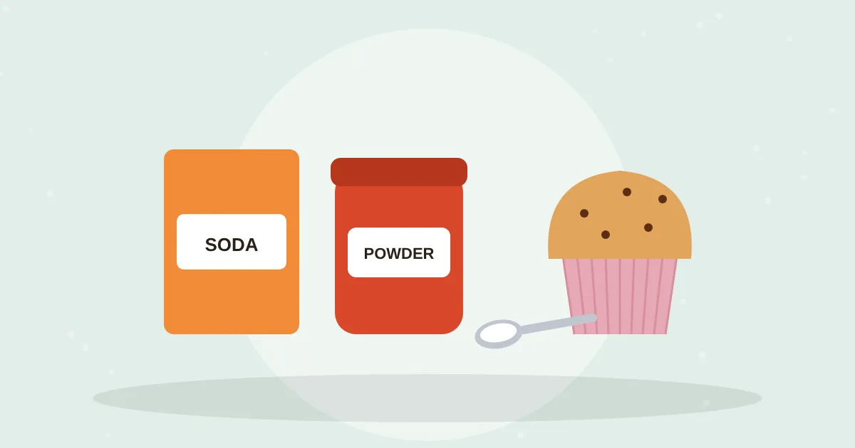Box of baking soda and a tin of baking powder side by side with measuring spoons and a fluffy muffin